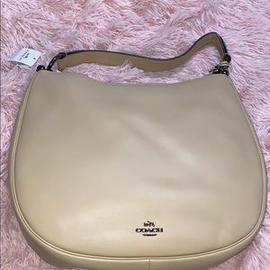 Nude coach purse